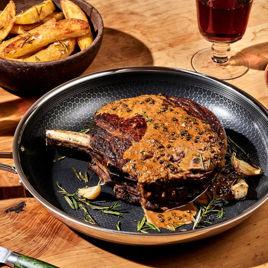 HexClad Hybrid Nonstick 12-Inch Frying Pan with Tempered Glass Lid, Stay-Cool Handle, Dishwasher-Friendly, Oven-Safe Up to 900°F, Induction Ready, Compatible with All Cooktops