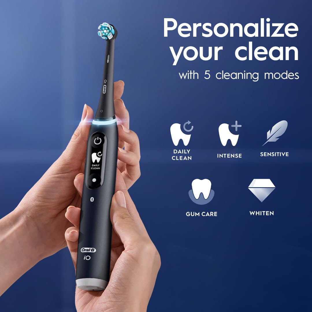 Oral-B iO Deep Clean + Protect Rechargeable Electric Toothbrush, Black with a iO Series 7 Toothbrush, 2 Replacement Brush Heads, and a Charging Travel Case